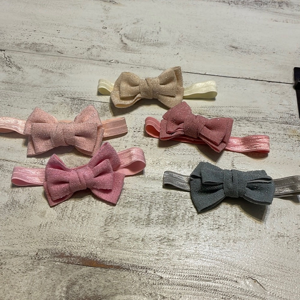 Lot of five baby girl sparkly bow headbands. Cream, gray and 3 shades of pink.